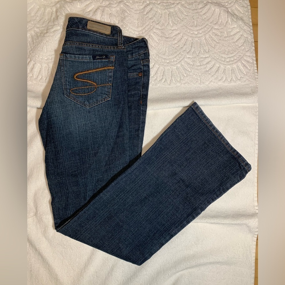 28" waist Silver Jeans dark wash flared